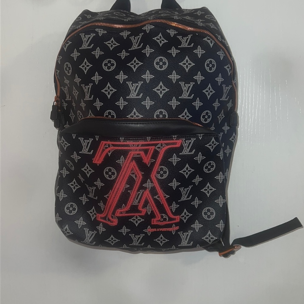 Louis Vuitton Apollo backpack upside down LV